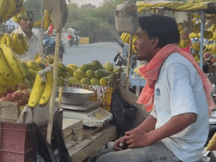 फल और सब्जी व्यापारी।