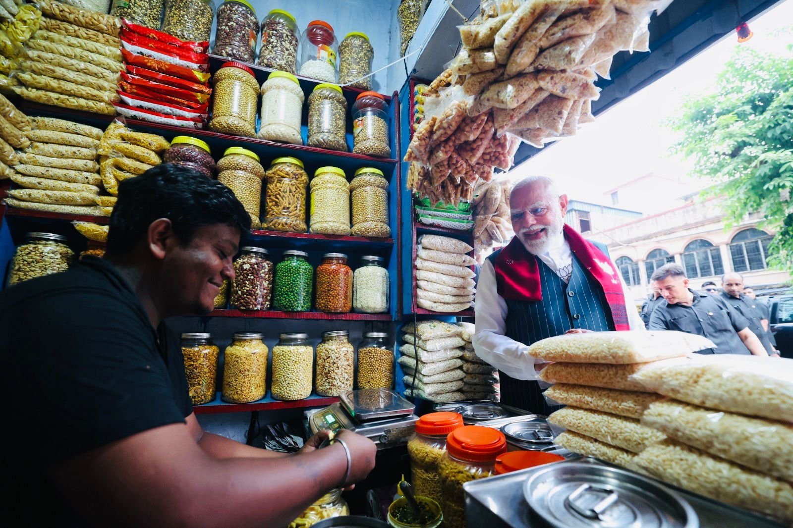 The PM also joked while the shopkeeper was making Jhalmuri.