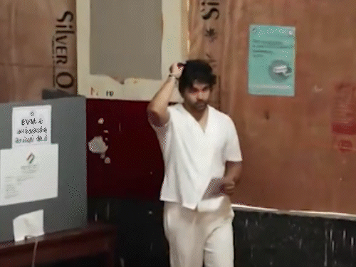 Actor-singer Dhruv Vikram cast his vote at a polling station in Chennai.