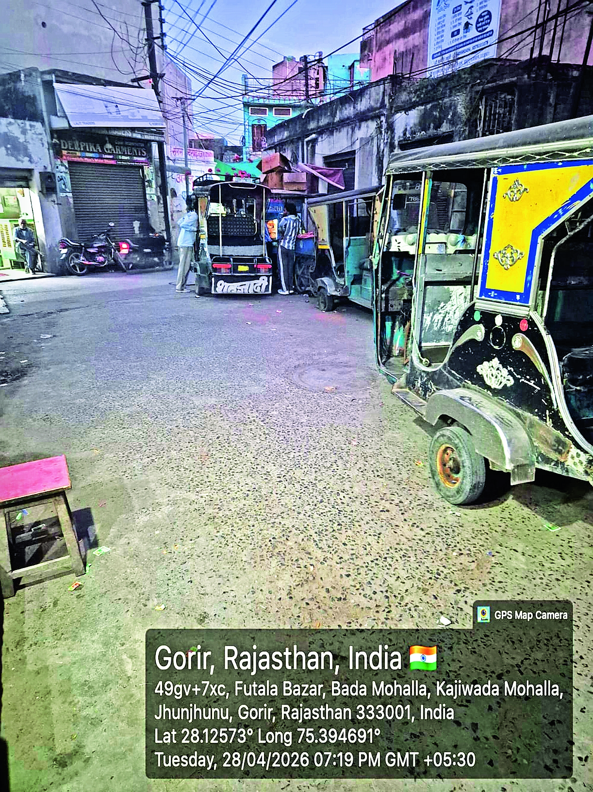 Auto rickshaws parked in front of shops in Ward 42 of Jhunjhunu create ...