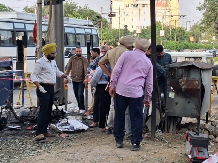 NIA team investigating after the blast outside BSF headquarters in Jalandhar.