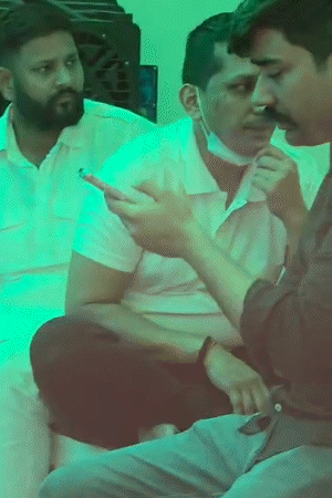 Aman Singh, Prateek Yadav’s brother-in-law, was seen outside the post-mortem house wearing a white T-shirt and mask.
