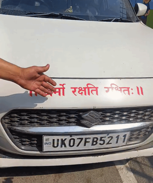 Hindu Raksha Dal workers showing the accused's car.