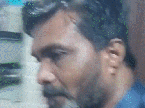 बंद फ्लैट को खोल कर व्यक्ति को बाहर ले जाया गया।