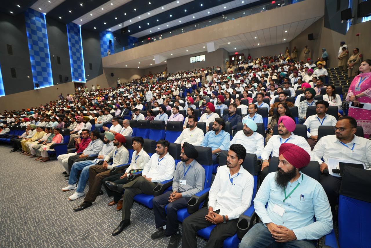 Youths sit to receive appointment letters at a function held in Bathinda.
