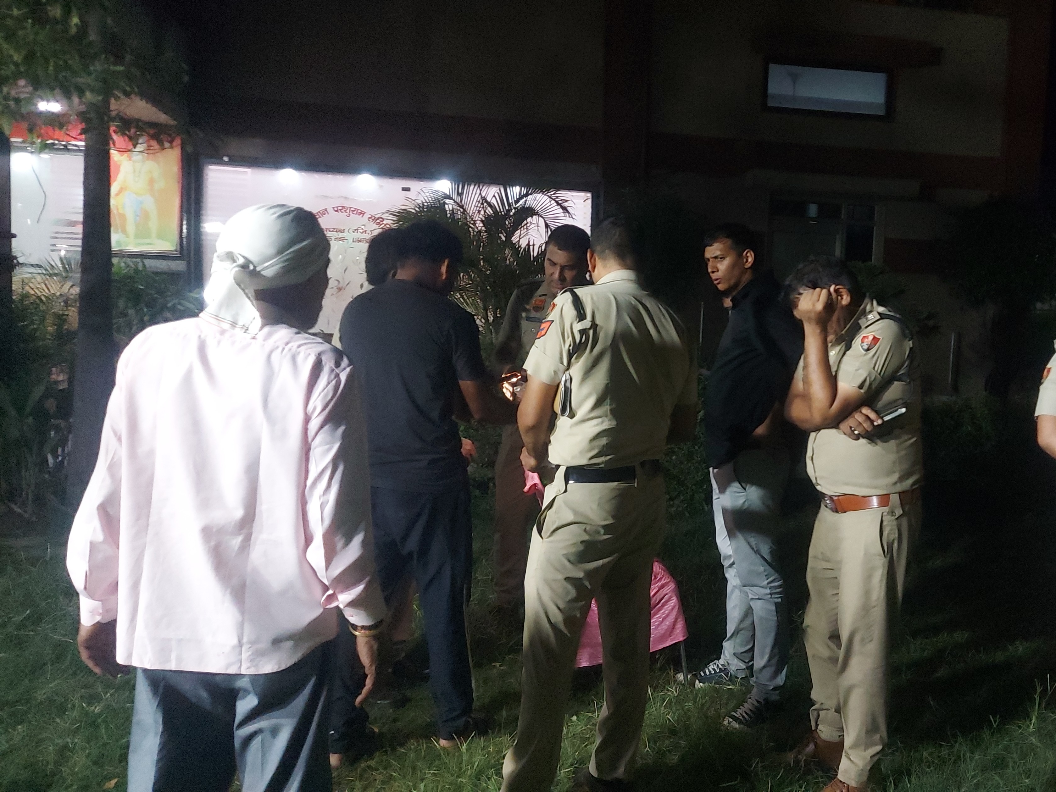 Police conducting an investigation at Parshuram Bhavan in Sampla.