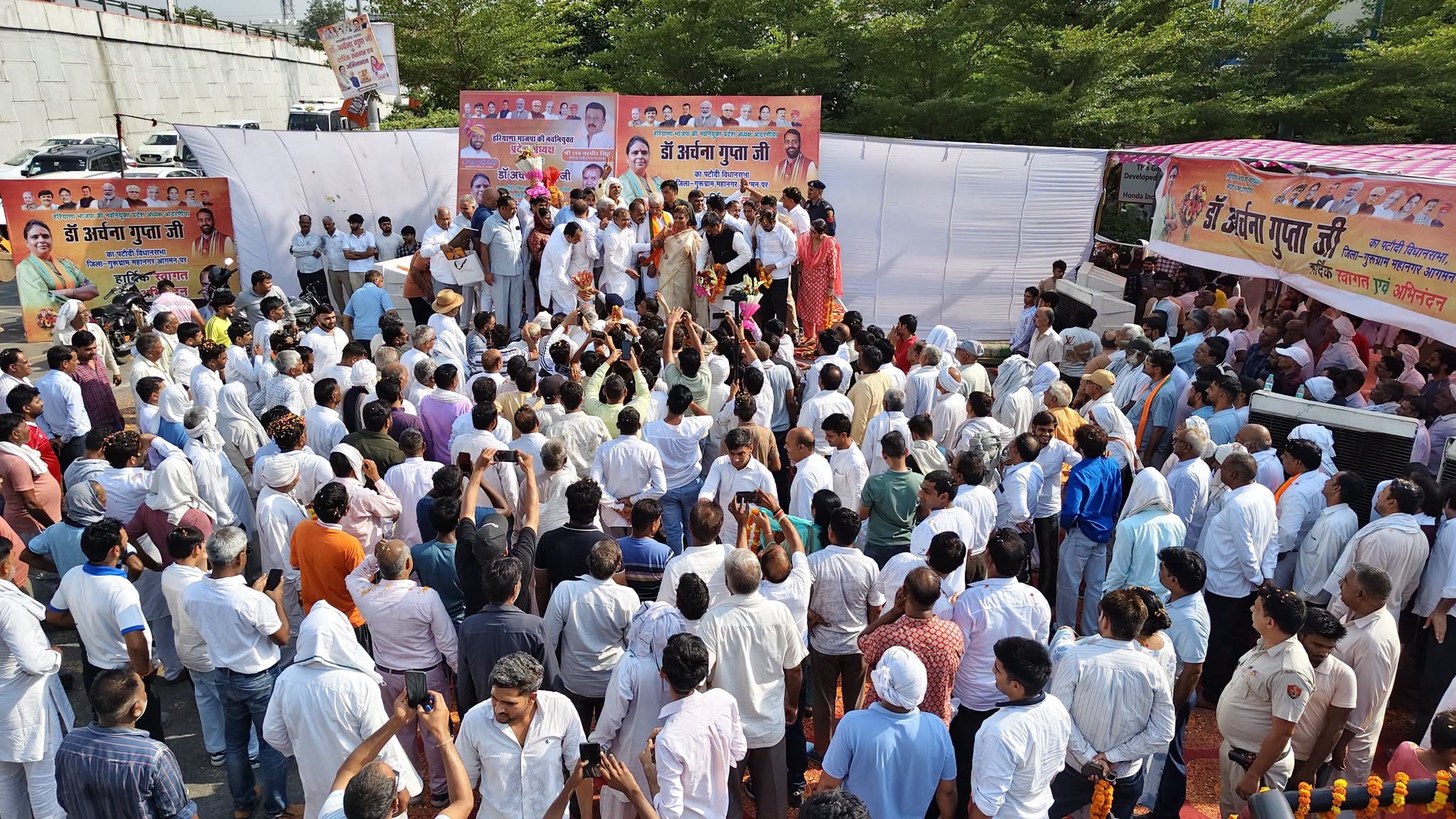 न्यू गुरुग्राम में आयोजित कार्यक्रम के दौरान भाजपा कार्यकर्ता।