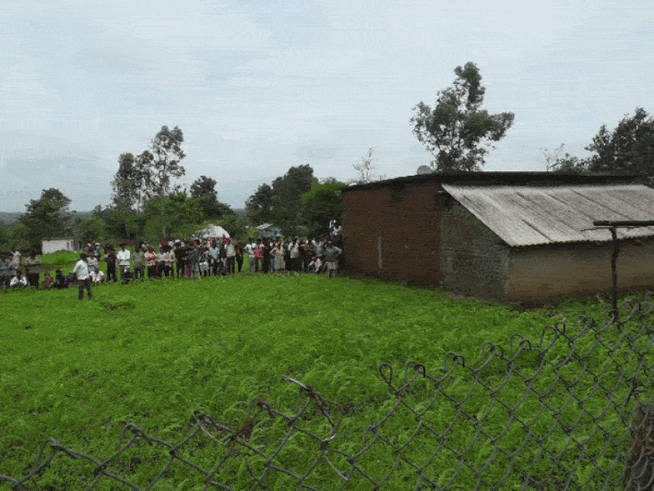 A crowd of villagers gathered during the 5-hour rescue operation