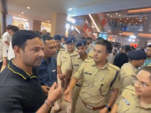Police taking Tej Pratap from City Centre Mall.