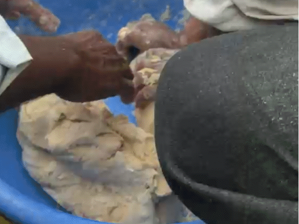 Farmers ate dal-bati on the road on Wednesday.