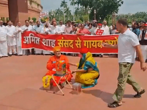 Opposition MPs staged a protest during Parliament's Monsoon Session over the alleged theft of offerings at the Ram Mandir.