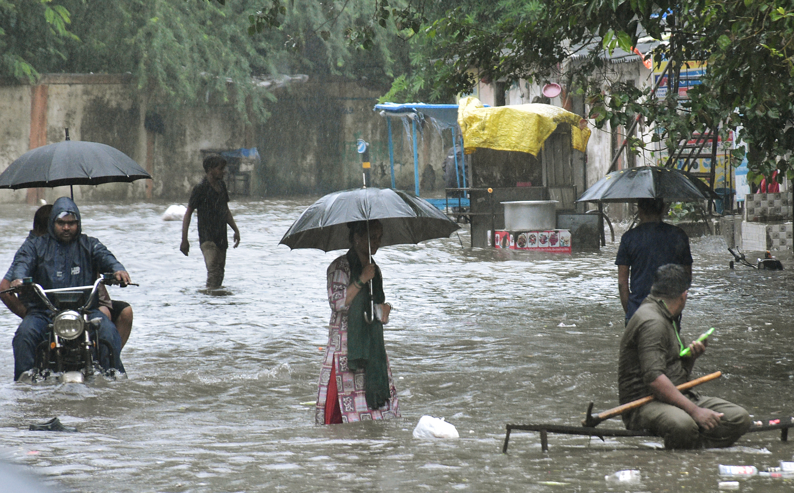 Water entered roads and houses in many areas of Surat