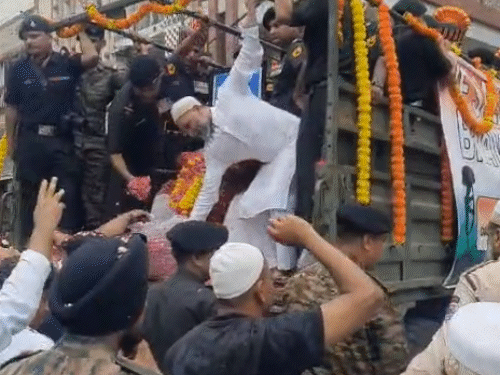 Major Hamza's mortal remains were carried in an army vehicle for the final journey.