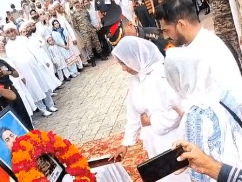 Major Hamza's wife and family paid tribute to him.