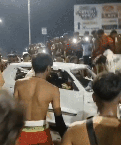 After the collision, a local youth climbed onto the car's roof and damaged the vehicle by jumping on it.