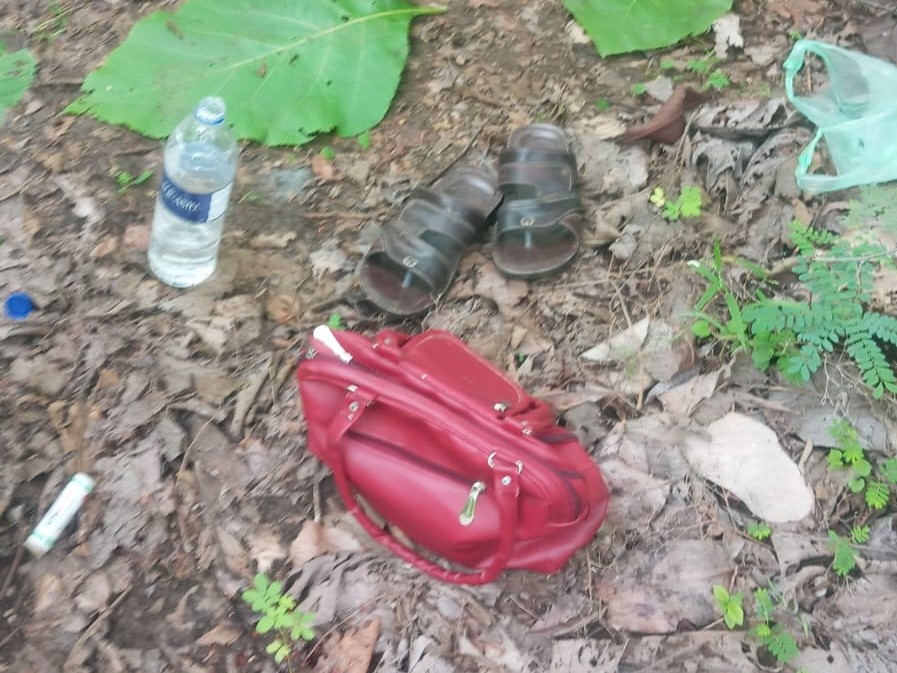 Sister-in-law Pinky's purse and water bottle were found.