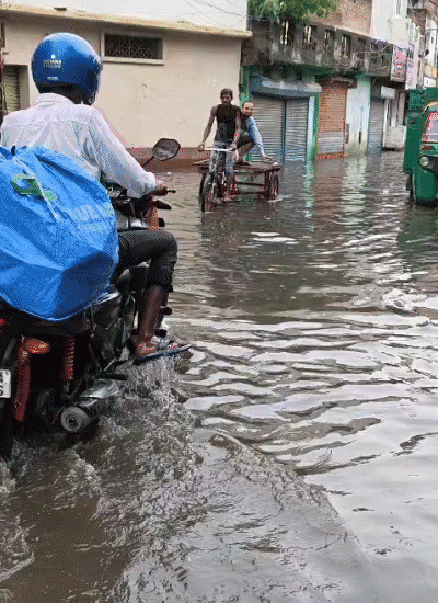 Heavy rain occurred in Begusarai, Bihar on Sunday. After the rain, roads were flooded with up to 3 feet of water.