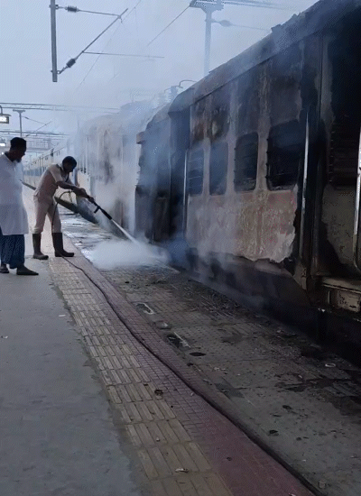 Fire brigade team extinguishing the fire in the train