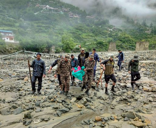 Team taking the injured to a nearby hospital after the disaster.