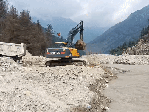 These days, due to rain again, Bhagirathi is in spate and the work of continuously removing debris is ongoing here.