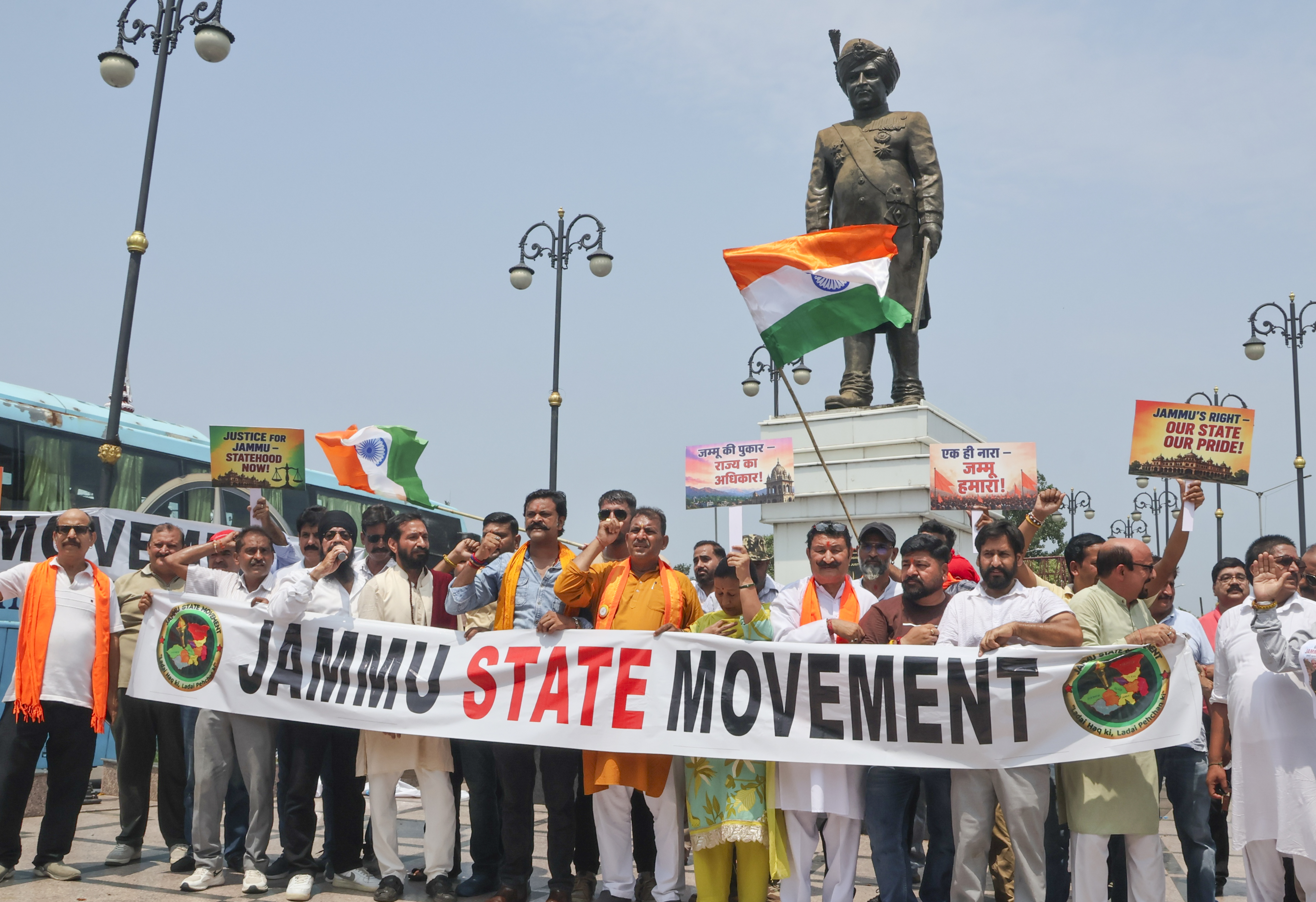 Members of 'Jammu State Movement' protested near the statue of Maharaja Hari Singh on Tawi Bridge in Jammu, demanding separate state status.