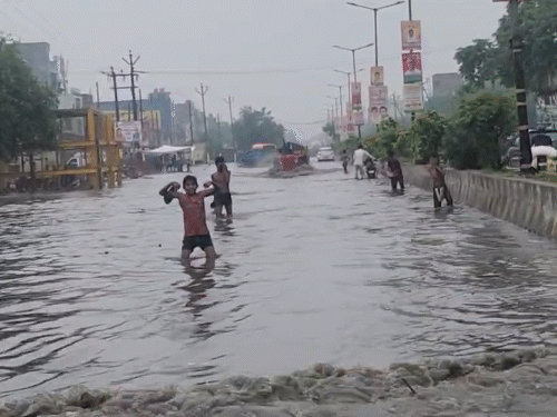 In Loni area of Ghaziabad, UP, the roads were so waterlogged that children were seen having fun.
