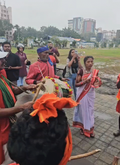 Jharkhandi artists perform a traditional dance at Jaipal Singh Stadium.