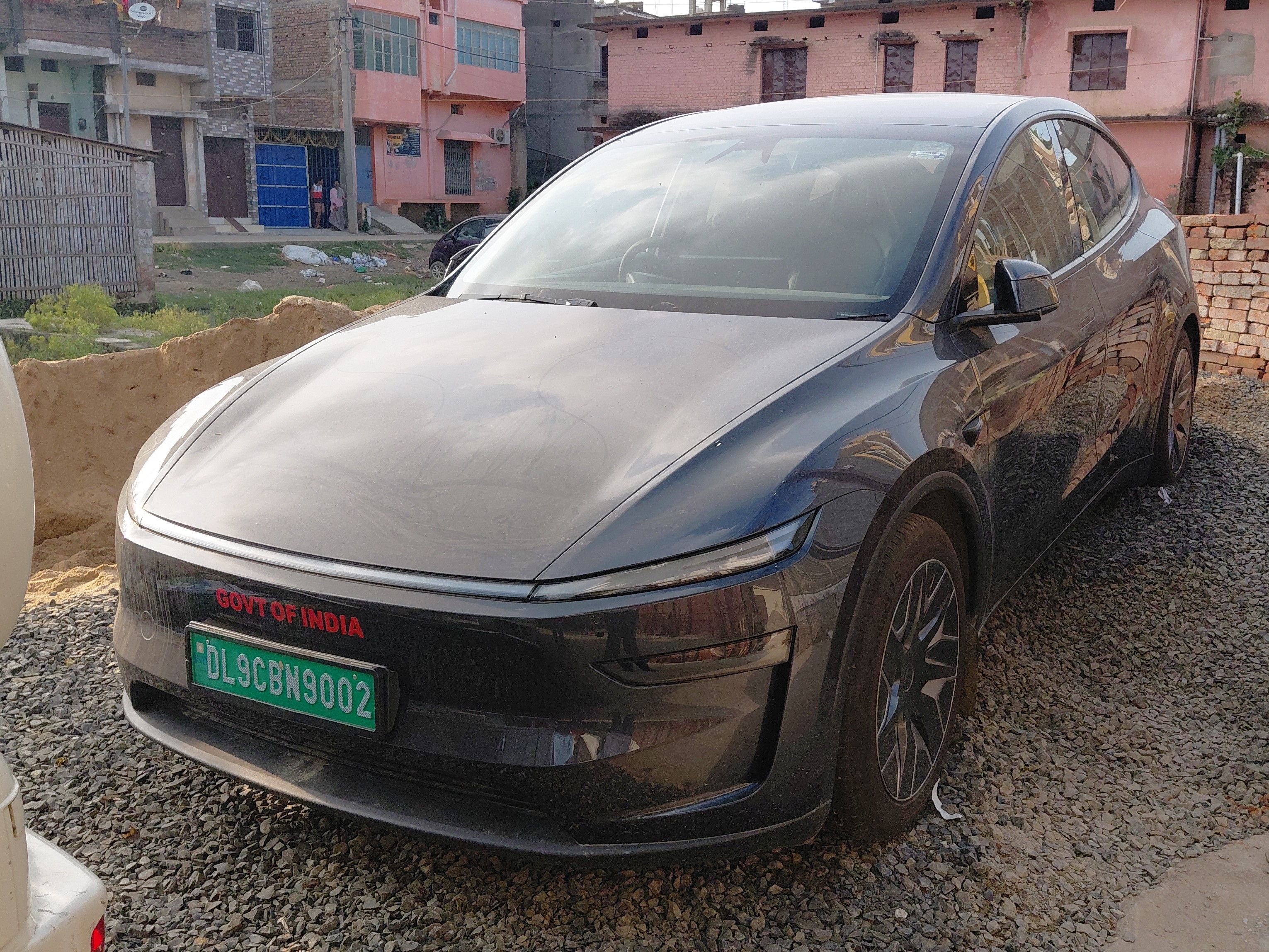 A driverless Tesla car was also found at Manish's house. 'Govt of India' was written above the number plate.