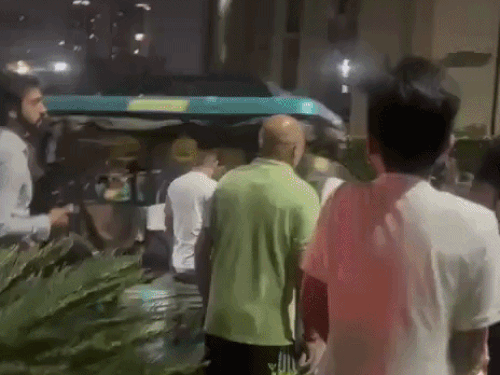 Residents assaulting a woman in Gurugram over feeding a street dog.