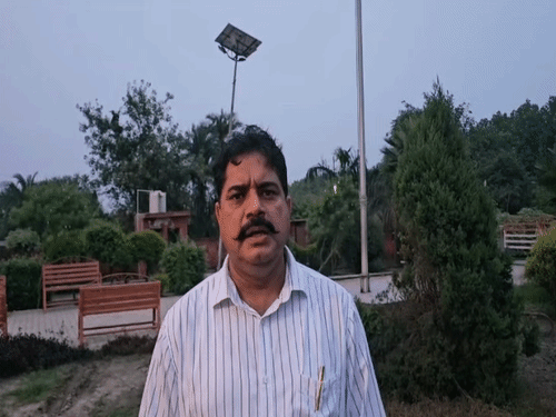 Temple founder Varyam Singh giving information.