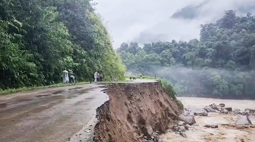 Due to heavy rain in Anjaw, Arunachal Pradesh, a part of the road was submerged in the river.