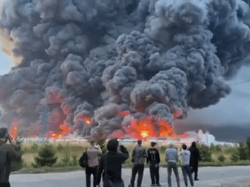 After the fire, a plume of black smoke was seen rising far.