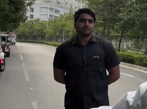 Security agency bouncers stopping runners from running on the roads of Gurugram's posh area.