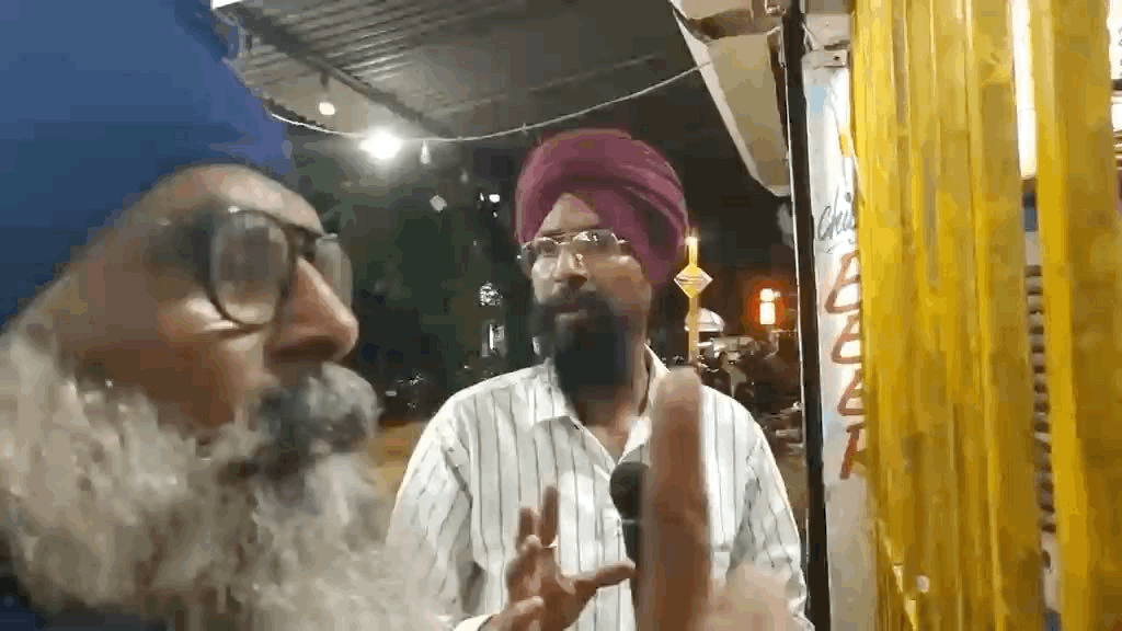 Nihang Singh warning the liquor store owner against allowing people to drink outside the shop