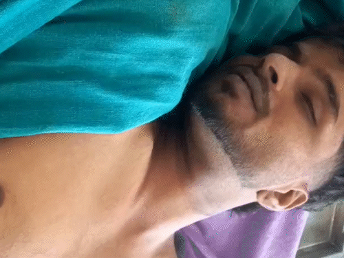Deep marks are visible on Rajkaran's neck