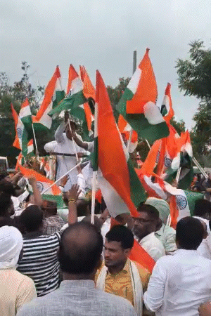 Tricolor is visible in the hands of workers instead of RJD flags.