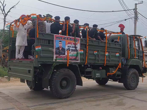 Ravi's mortal remains placed in the Army vehicle