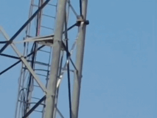 People gathered at the spot after receiving information about the woman climbing the tower