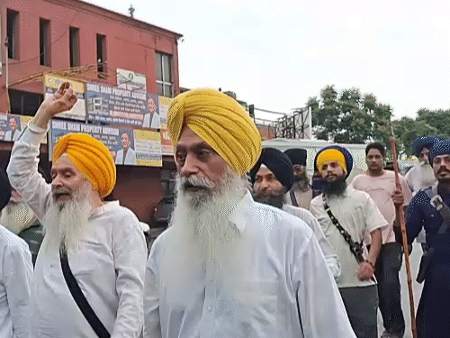 SGPC members raising slogans in Amritsar.