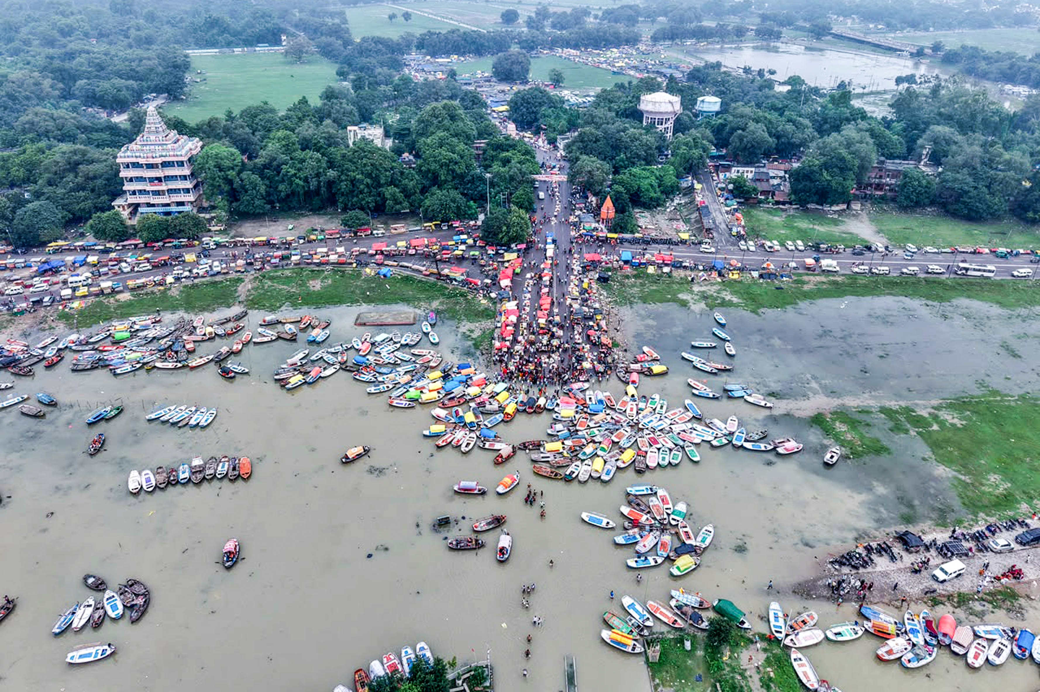 Boating has been stopped due to rising water levels of the Ganga in Prayagraj, Uttar Pradesh. As a result, boats are standing on the banks.