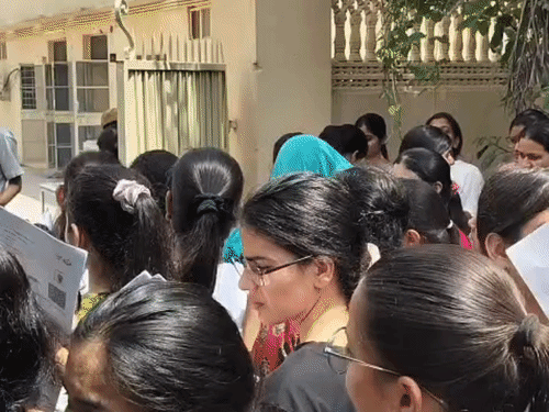 Crowd of students gathered for the second shift exam.