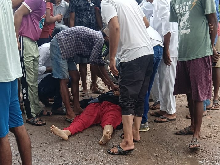 Woman's body lying at the spot after the accident.