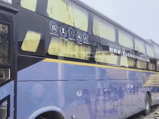 The bus number is UP-83, and it is registered in Firozabad, Uttar Pradesh.