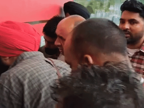 Passengers arrived at Amritsar Airport to catch a flight to Dubai