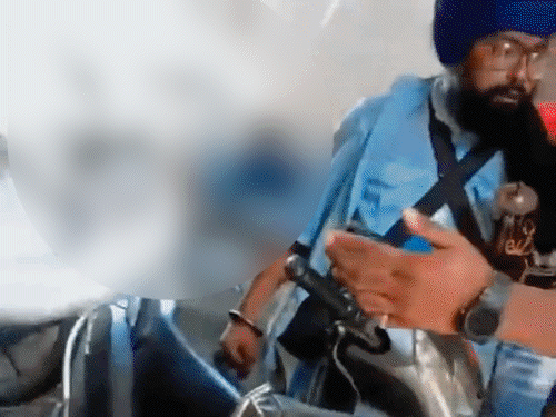 After being beaten, the young man began pleading with the Nihang, holding his feet and apologising