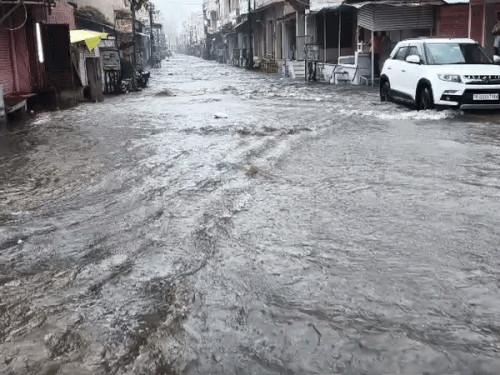Water flowed like a river on the streets of Sawai Madhopur city in Rajasthan after rain on Friday.