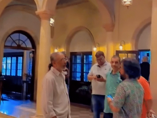 At the location, director Prakash Jha discusses the scene with Chandan Roy Sanyal.