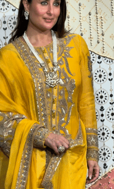 Kareena wore a yellow suit for the celebrations.