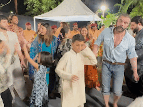 Sohail Khan dancing with children.