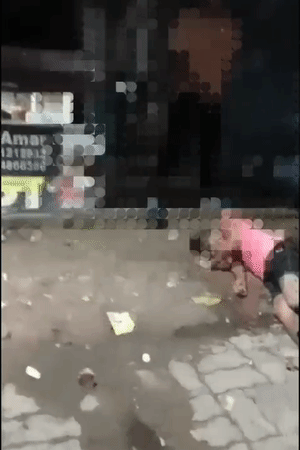 बेसुध पड़े एक युवक पर पेशाब किया।